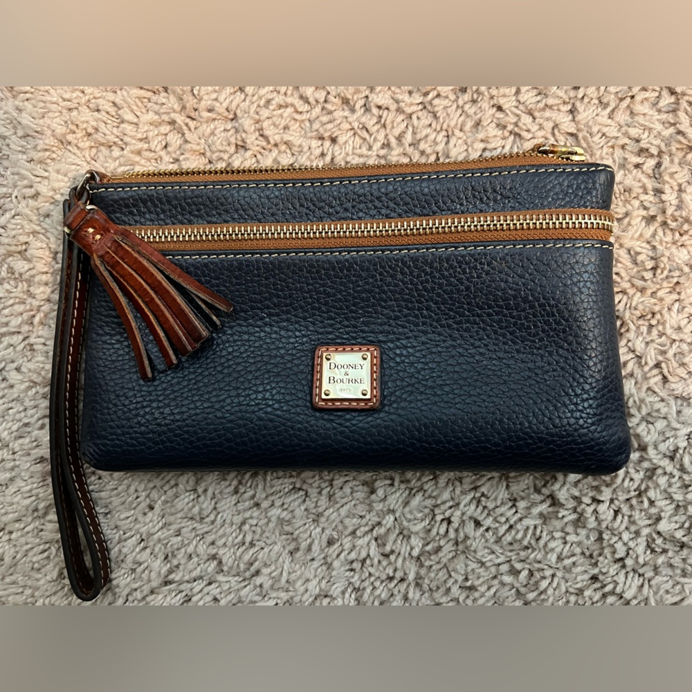 Dooney & Burke wristlet wallet. Large. Was used but still in great condition.